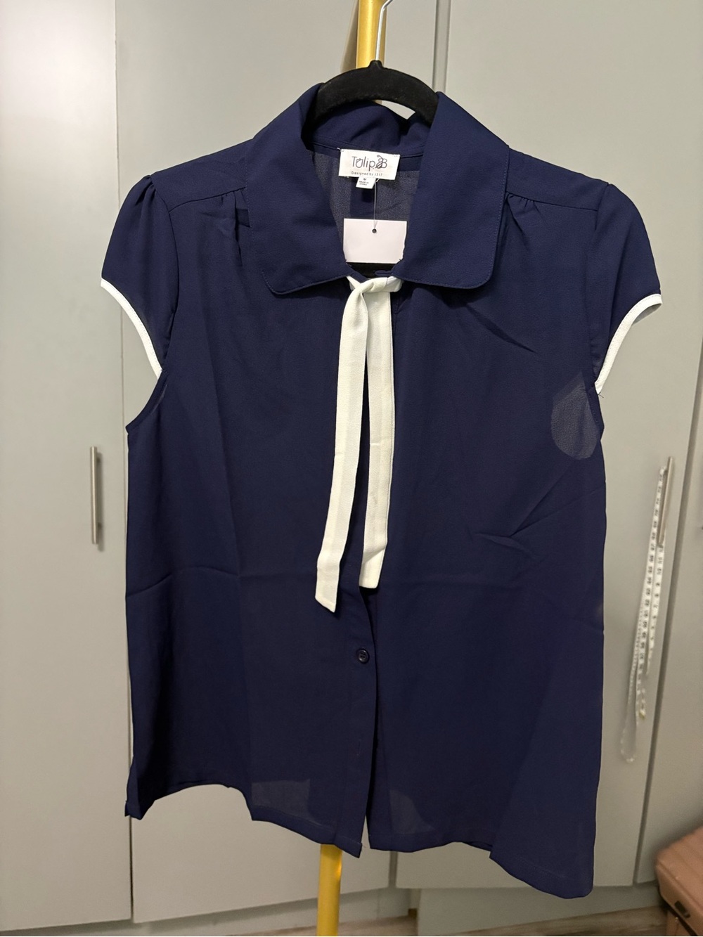 Tulip B Tie-Neck Navy Sleeveless Blouse with Contrast Trim
